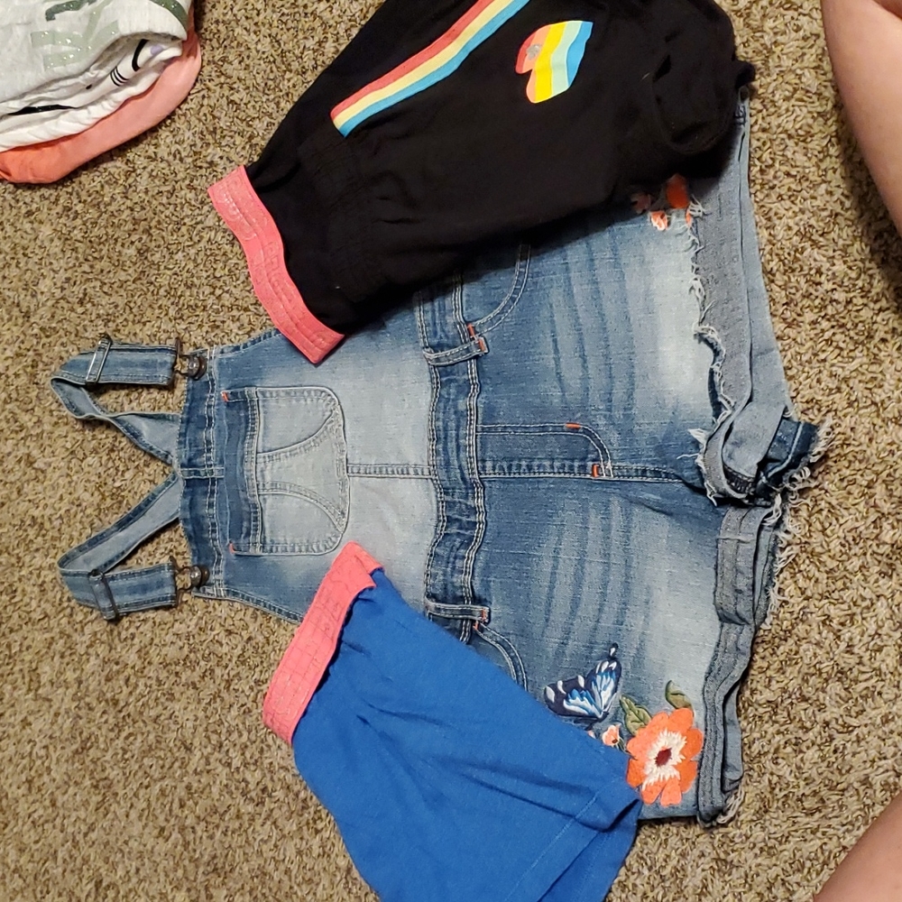 Girl's jean overall shorts and three pair of cotton shorts